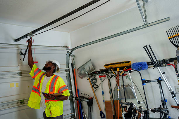 Professional Garage Door Panel Replacement technician working in Greenlawn, NY